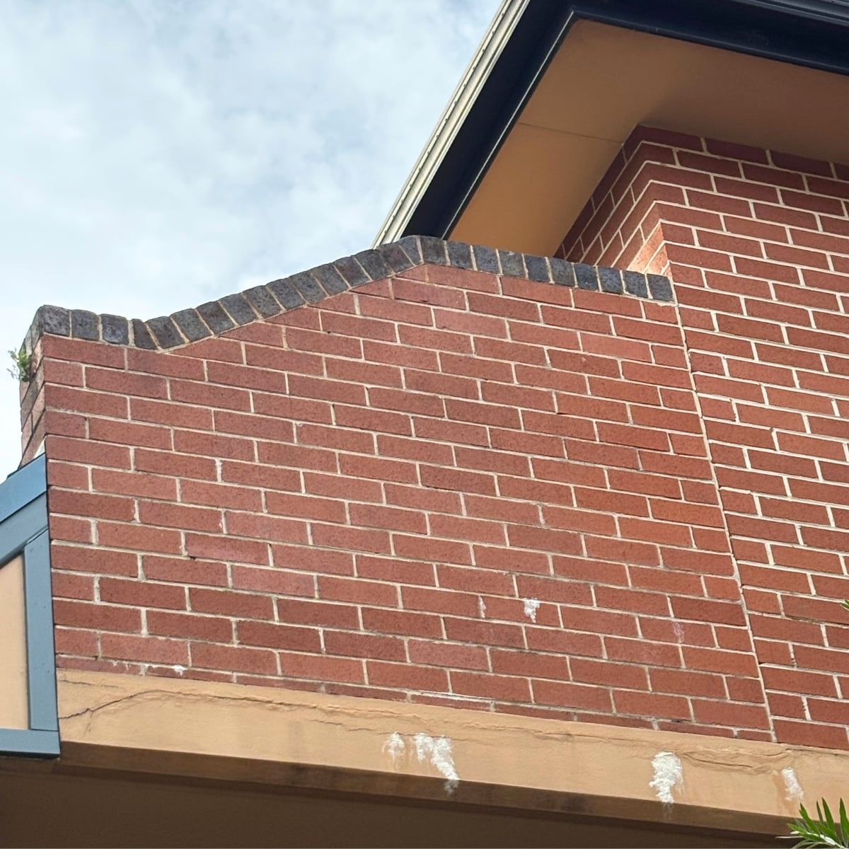 Brick façade — common entry after