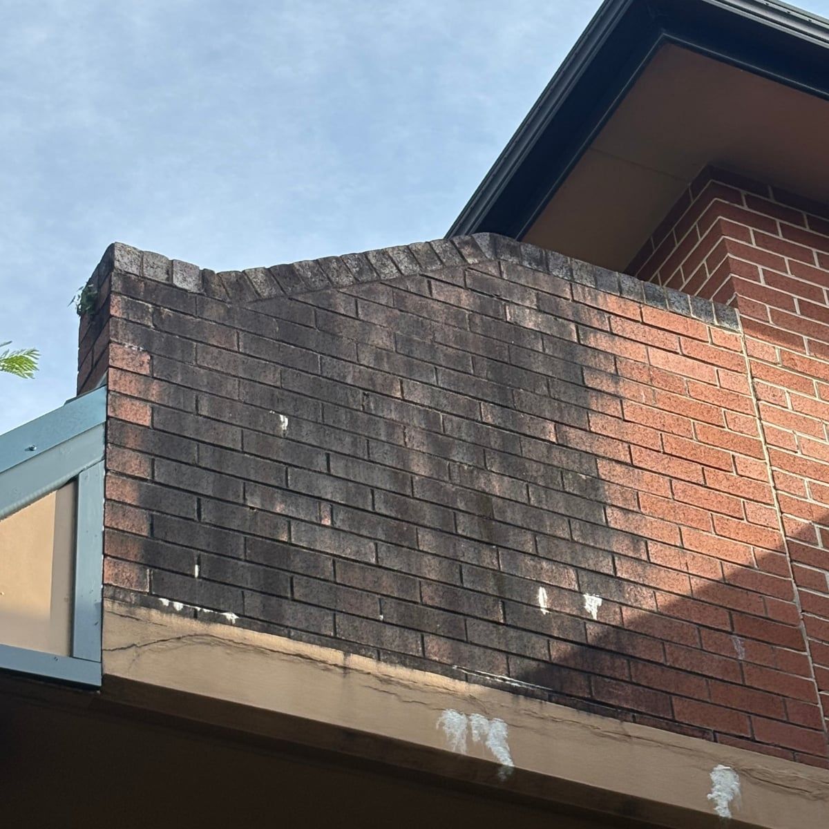 Brick façade — common entry before